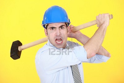 10852489-angry-man-with-sledge-hammer.jpg